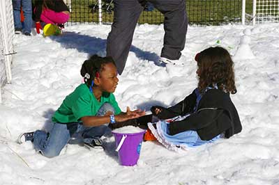Snow day with children playing