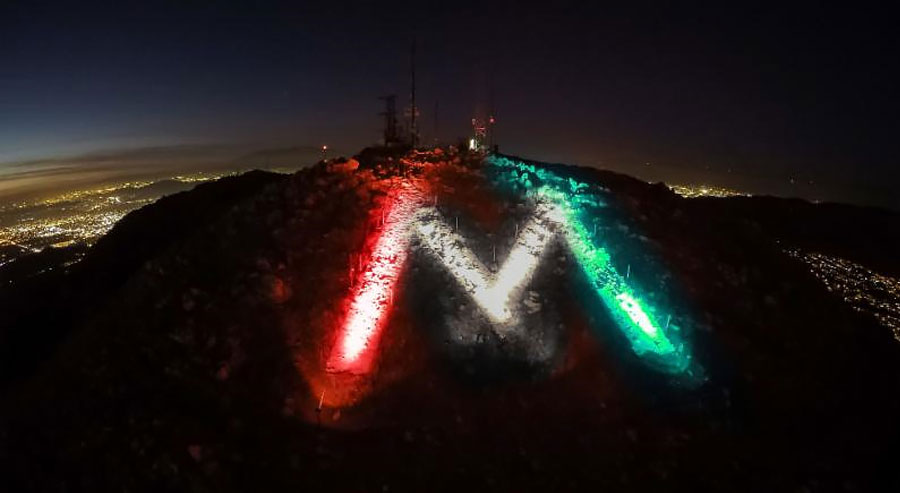 the "M" lit red, white and green